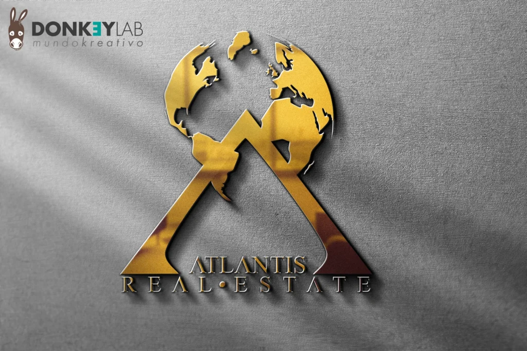 Logo 3D di Atlantis Real Estate applicato come insegna: simbolo dorato su fondo scuro